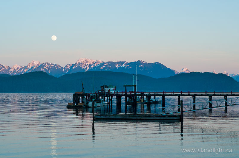 Rising Moon Over Squirrel Cove Dock - Cortes Island Harbour photo